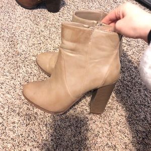 Cute tan faux leather bootie with faux wood heel!